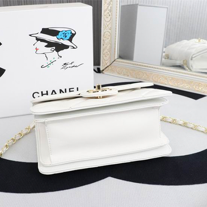 CHANEL Quilted Pouch Bag in Lambskin Leather