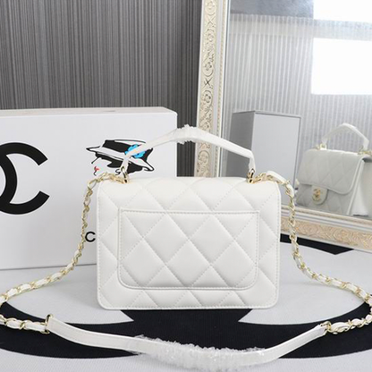 CHANEL Quilted Pouch Bag in Lambskin Leather