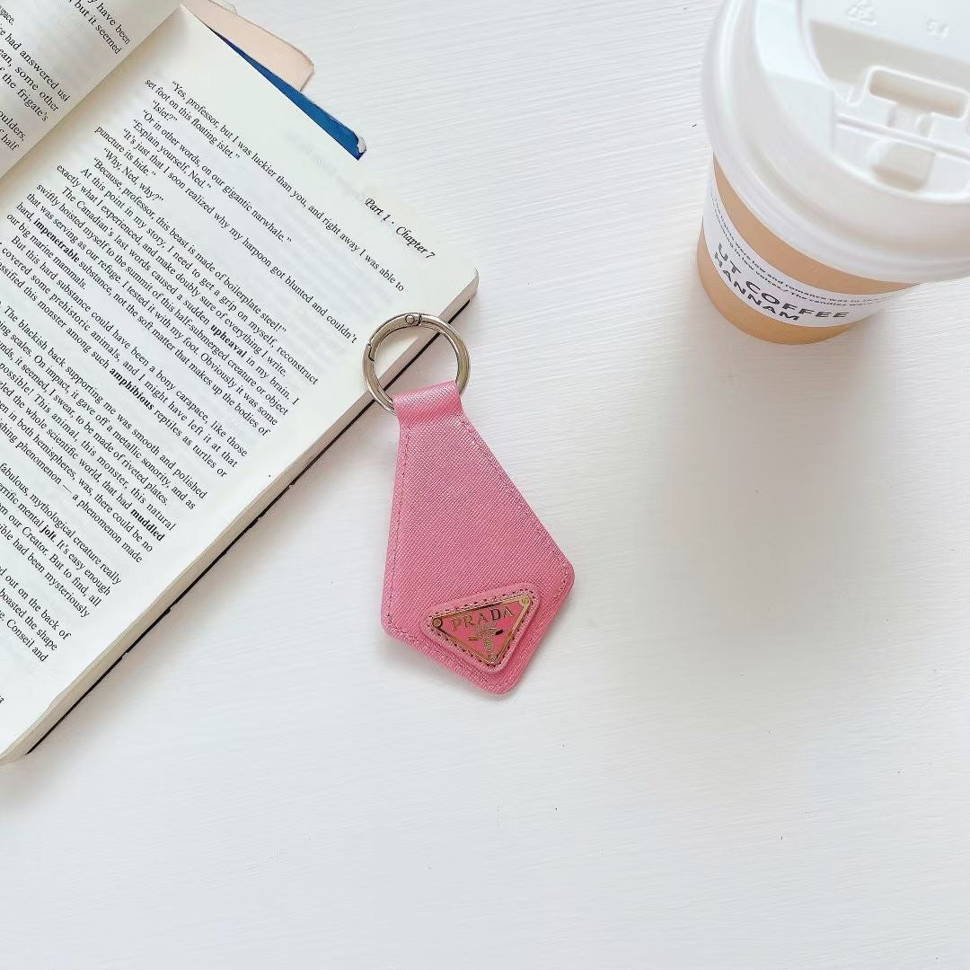 Luxury PR-Inspired AirTag Holder Keychain Collection