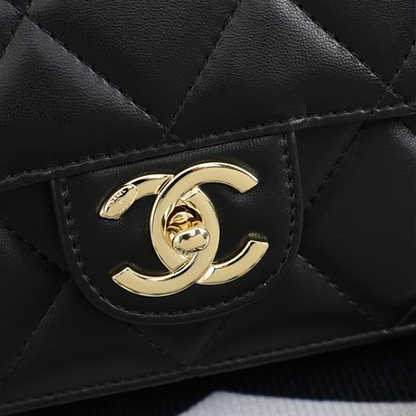 CHANEL Quilted Pouch Bag in Lambskin Leather