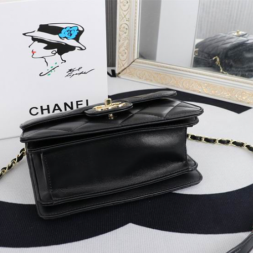 CHANEL Quilted Pouch Bag in Lambskin Leather