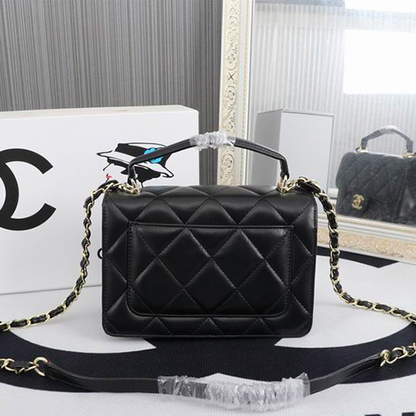 CHANEL Quilted Pouch Bag in Lambskin Leather