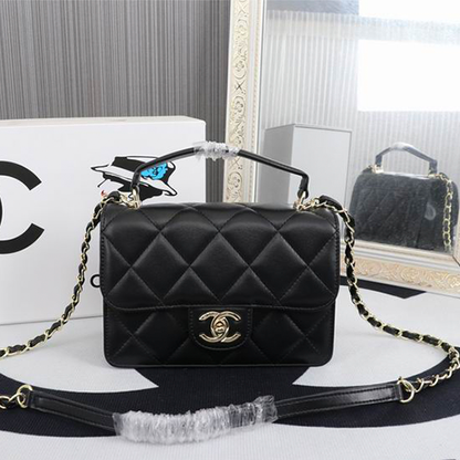 CHANEL Quilted Pouch Bag in Lambskin Leather